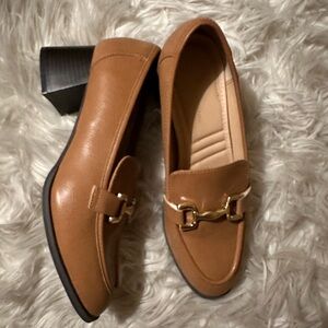Light brown loafers with chunky heel and buckle